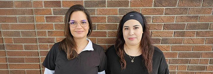 Jess and Brandi Pose for a Chiropractic Technician Team Photo