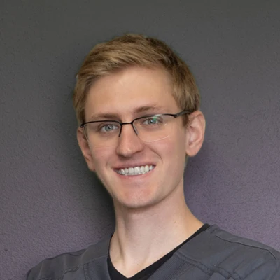 Drew Luse Posing for a Photo for Bio